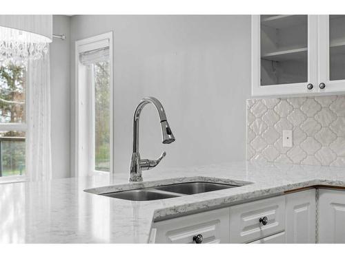 543 Douglas Glen Boulevard Se, Calgary, AB - Indoor Photo Showing Kitchen With Double Sink