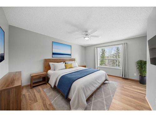543 Douglas Glen Boulevard Se, Calgary, AB - Indoor Photo Showing Bedroom