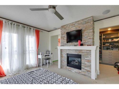 2402 25A Street Sw, Calgary, AB - Indoor Photo Showing Living Room With Fireplace