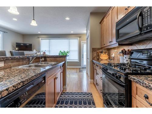 1720 24 Avenue Nw, Calgary, AB - Indoor Photo Showing Kitchen With Double Sink With Upgraded Kitchen