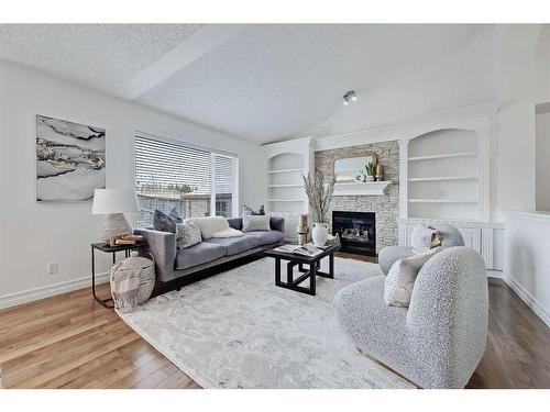 1469 Strathcona Drive Sw, Calgary, AB - Indoor Photo Showing Living Room With Fireplace