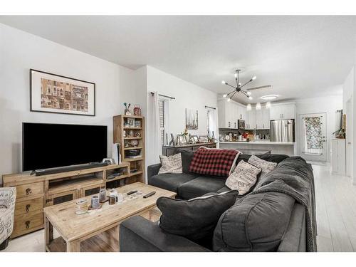 805-2001 Luxstone Boulevard Sw, Airdrie, AB - Indoor Photo Showing Living Room