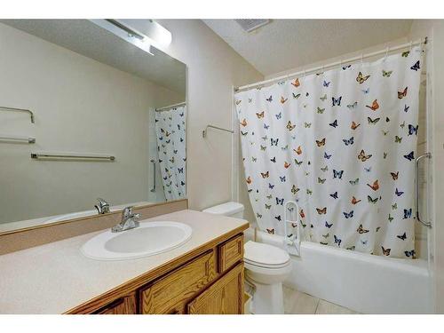 253 Arbour Cliff Close Nw, Calgary, AB - Indoor Photo Showing Laundry Room