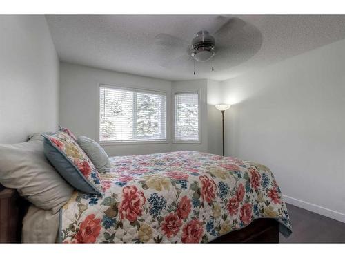 1106-7451 Springbank Boulevard Sw, Calgary, AB - Indoor Photo Showing Bedroom