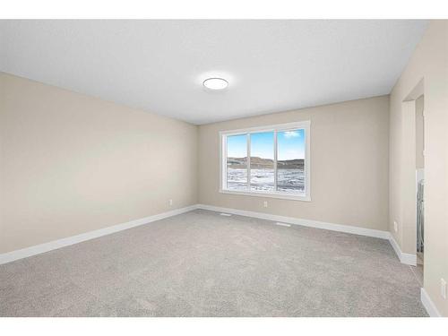506 Clydesdale Way, Cochrane, AB - Indoor Photo Showing Other Room