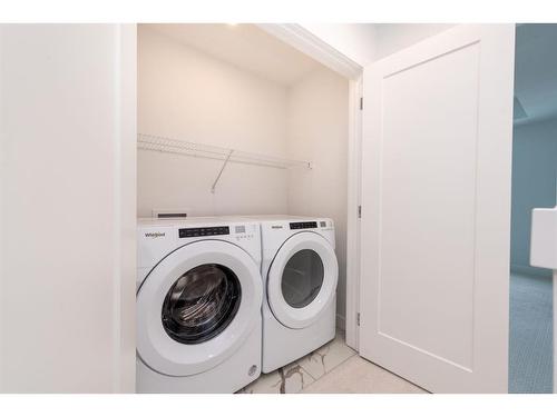 132 Merganser Drive W, Chestermere, AB - Indoor Photo Showing Laundry Room