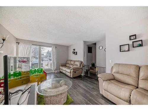 45 Falsby Place Ne, Calgary, AB - Indoor Photo Showing Living Room