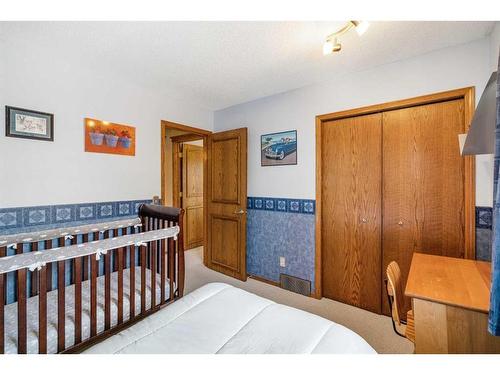 153 Scanlon Hill Nw, Calgary, AB - Indoor Photo Showing Bedroom