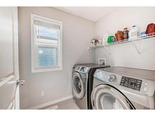 23 Walgrove Link Se, Calgary, AB - Indoor Photo Showing Laundry Room