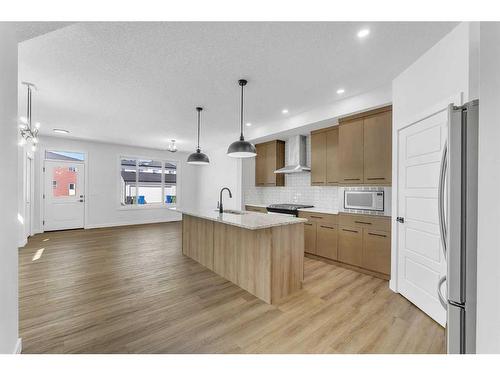 241 Chelsea Place, Chestermere, AB - Indoor Photo Showing Kitchen With Upgraded Kitchen