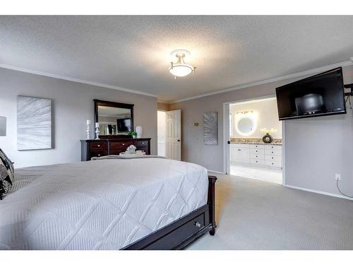 210 Canova Close Sw, Calgary, AB - Indoor Photo Showing Bedroom