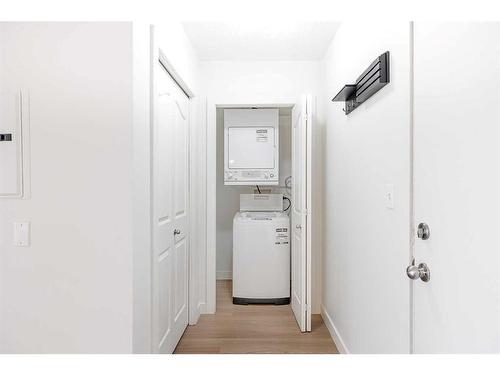 1510-1111 6 Avenue Sw, Calgary, AB - Indoor Photo Showing Laundry Room