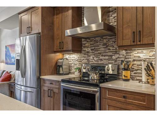 412 Riva Heights, Canmore, AB - Indoor Photo Showing Kitchen