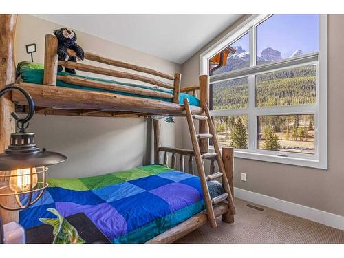 412 Riva Heights, Canmore, AB - Indoor Photo Showing Bedroom