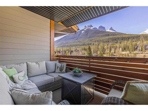 412 Riva Heights, Canmore, AB - Outdoor With Deck Patio Veranda With Exterior