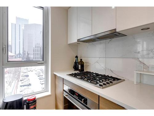 611-108 Waterfront Court Sw, Calgary, AB - Indoor Photo Showing Kitchen With Upgraded Kitchen