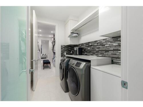 41 Aspen Ridge Terrace Sw, Calgary, AB - Indoor Photo Showing Laundry Room