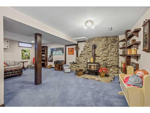 48068 244 Avenue West, Rural Foothills County, AB - Indoor With Fireplace