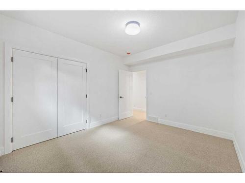 74 Valour Circle Sw, Calgary, AB - Indoor Photo Showing Other Room
