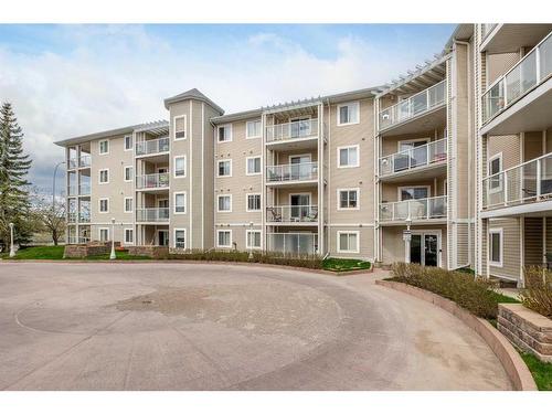 201-260 Shawville Way Se, Calgary, AB - Outdoor With Balcony With Facade