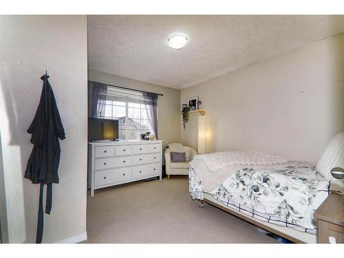 102 Chapalina Rise Se, Calgary, AB - Indoor Photo Showing Bedroom