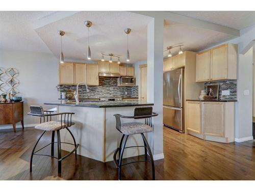 102 Chapalina Rise Se, Calgary, AB - Indoor Photo Showing Kitchen With Upgraded Kitchen