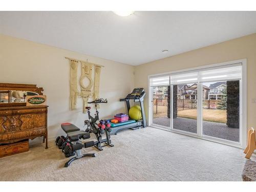 102 Bayview Circle Sw, Airdrie, AB - Indoor Photo Showing Gym Room