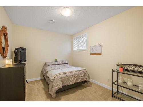 102 Bayview Circle Sw, Airdrie, AB - Indoor Photo Showing Bedroom