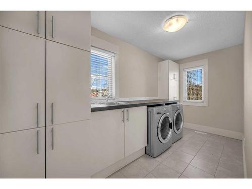 28 Tusslewood Drive Nw, Calgary, AB - Indoor Photo Showing Laundry Room