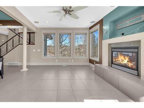 28 Tusslewood Drive Nw, Calgary, AB - Indoor With Fireplace