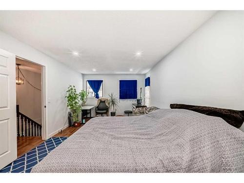 7 Hawksley Crescent Nw, Calgary, AB - Indoor Photo Showing Bedroom