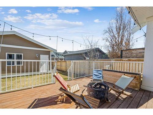 310 Cooperstown Common Sw, Airdrie, AB - Outdoor With Deck Patio Veranda With Exterior