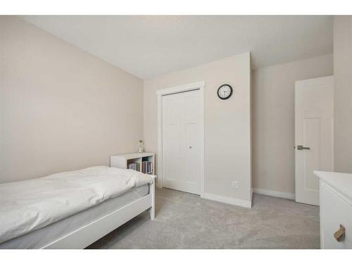 310 Cooperstown Common Sw, Airdrie, AB - Indoor Photo Showing Bedroom