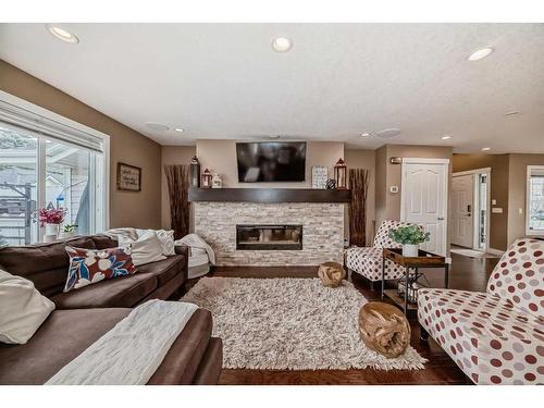 15218 Prestwick Boulevard Se, Calgary, AB - Indoor Photo Showing Living Room With Fireplace