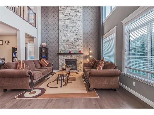 35 Masters Point Se, Calgary, AB - Indoor Photo Showing Living Room With Fireplace