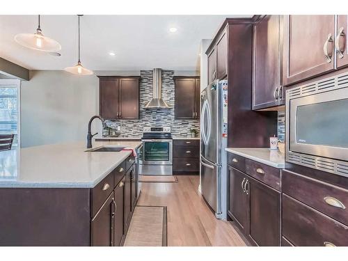 35 Masters Point Se, Calgary, AB - Indoor Photo Showing Kitchen With Upgraded Kitchen