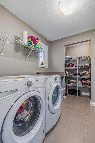 35 Masters Point Se, Calgary, AB - Indoor Photo Showing Laundry Room