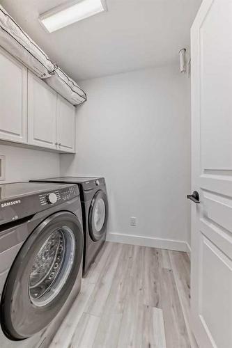 108-59 22 Avenue Sw, Calgary, AB - Indoor Photo Showing Laundry Room