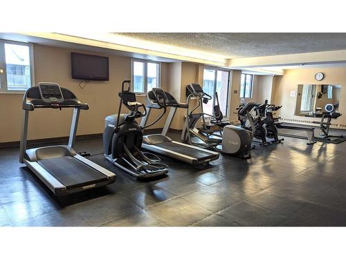1411-738 3 Avenue Sw, Calgary, AB - Indoor Photo Showing Gym Room