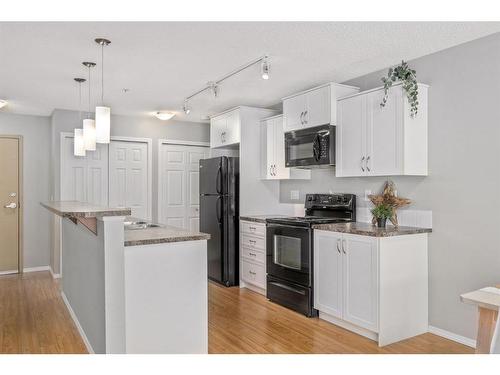2130-700 Willowbrook Road Nw, Airdrie, AB - Indoor Photo Showing Kitchen