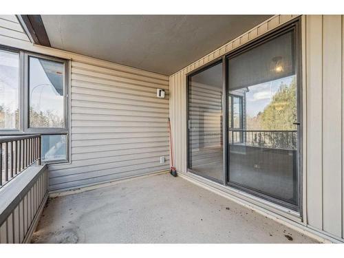 203-2425 90 Avenue Sw, Calgary, AB - Outdoor With Balcony With Exterior