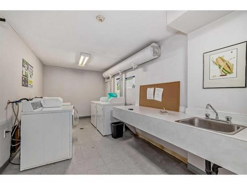 206-630 57 Avenue Sw, Calgary, AB - Indoor Photo Showing Laundry Room