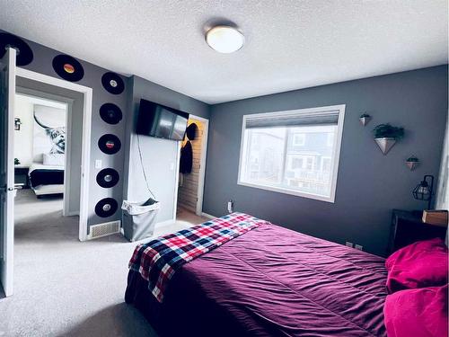 286 Mountainview Drive, Okotoks, AB - Indoor Photo Showing Bedroom