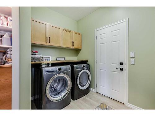 2720 Coopers Manor Sw, Airdrie, AB - Indoor Photo Showing Laundry Room