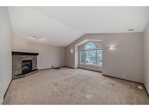 33 Springbank Rise Sw, Calgary, AB - Indoor With Fireplace