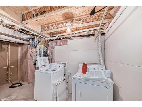 33 Springbank Rise Sw, Calgary, AB - Indoor Photo Showing Laundry Room