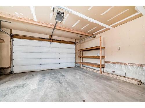 33 Springbank Rise Sw, Calgary, AB - Indoor Photo Showing Garage