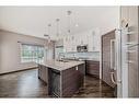 33 Springbank Rise Sw, Calgary, AB  - Indoor Photo Showing Kitchen With Upgraded Kitchen 