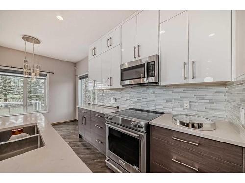 33 Springbank Rise Sw, Calgary, AB - Indoor Photo Showing Kitchen With Upgraded Kitchen