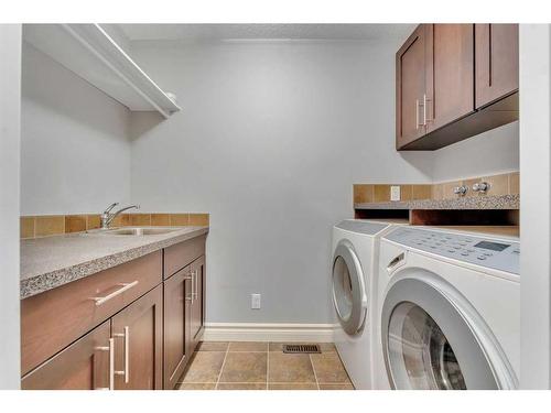 50 Sage Hill Way Nw, Calgary, AB - Indoor Photo Showing Laundry Room